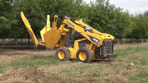 rent a skid steer with a tree spade|skid loader tree spade rental.